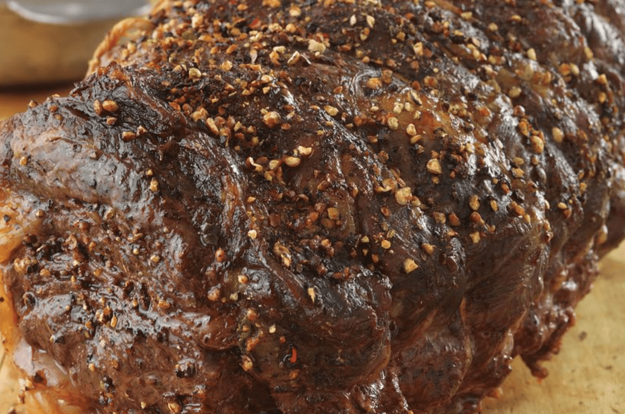 Garlic and Tri-Pepper-Crusted Beef Roast with Balsamic Sauce