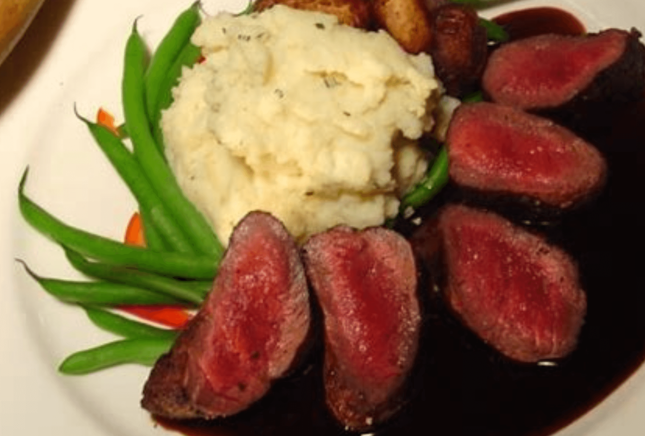 Pan-Seared Venison Medallions with a Berry Balsamic Sauce