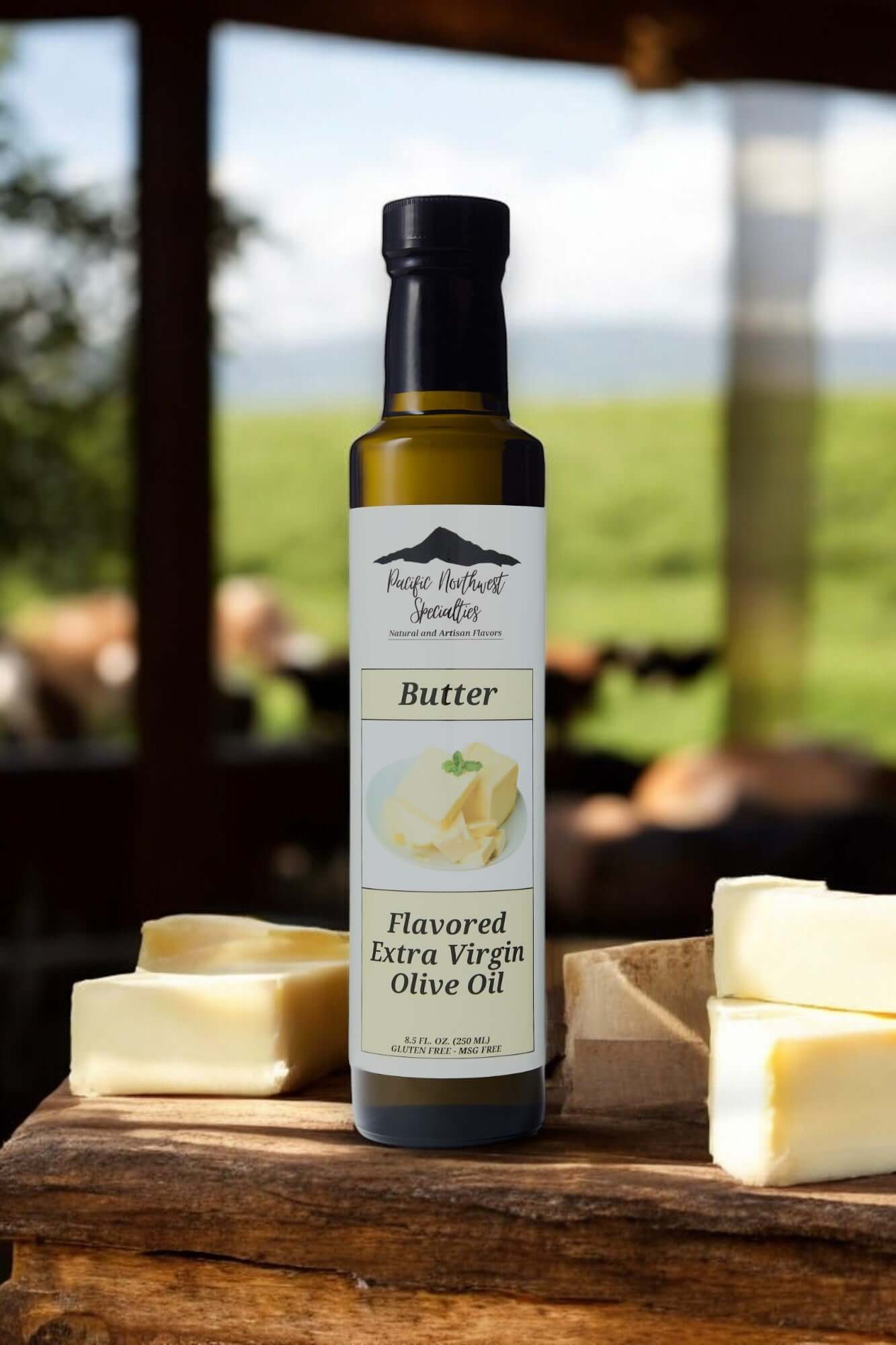 Butter Flavored Extra Virgin Olive Oil bottle on a wooden surface with butter blocks, showcasing rich flavor and healthy fats.