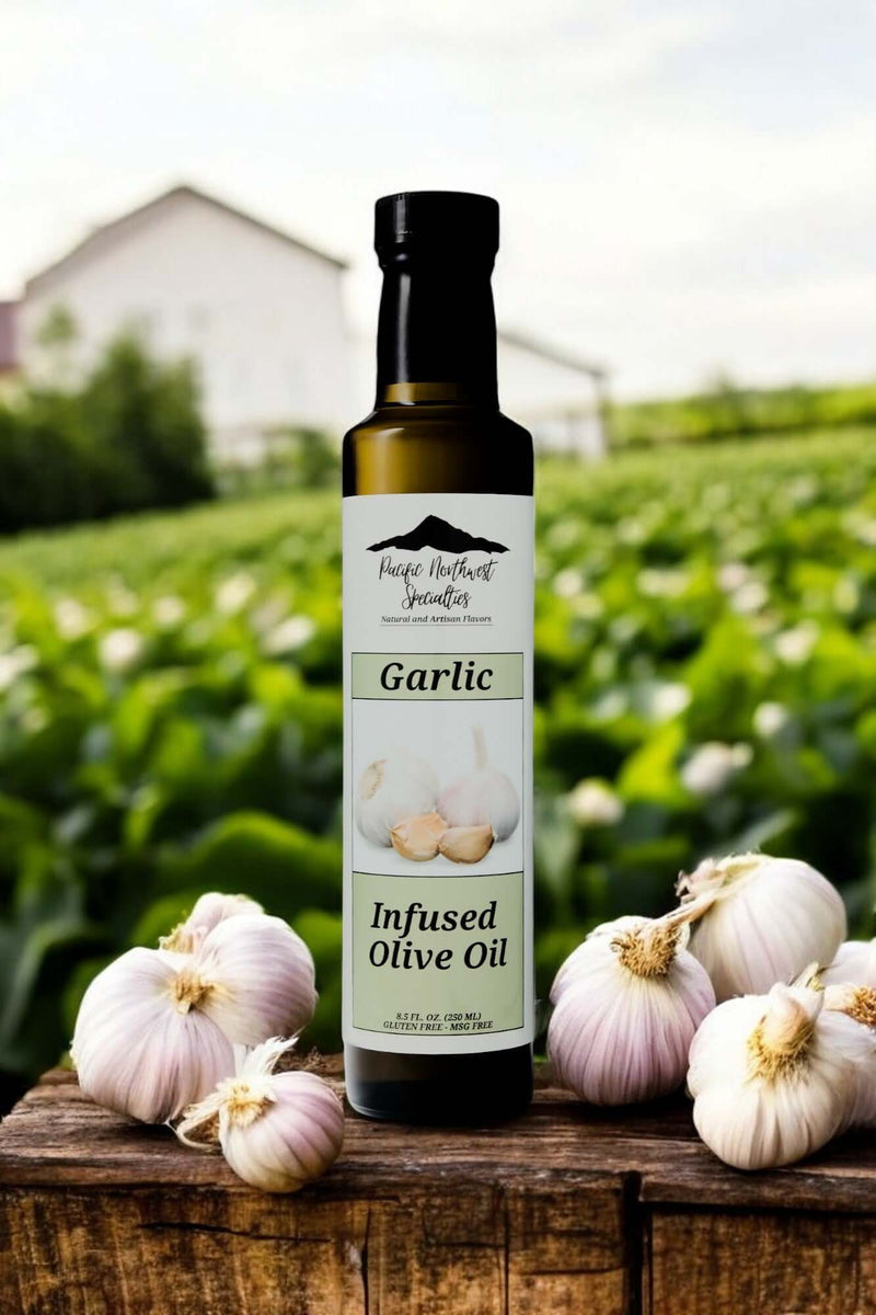 Garlic Infused Olive Oil bottle with fresh garlic on a wooden table, set against a lush farm backdrop.