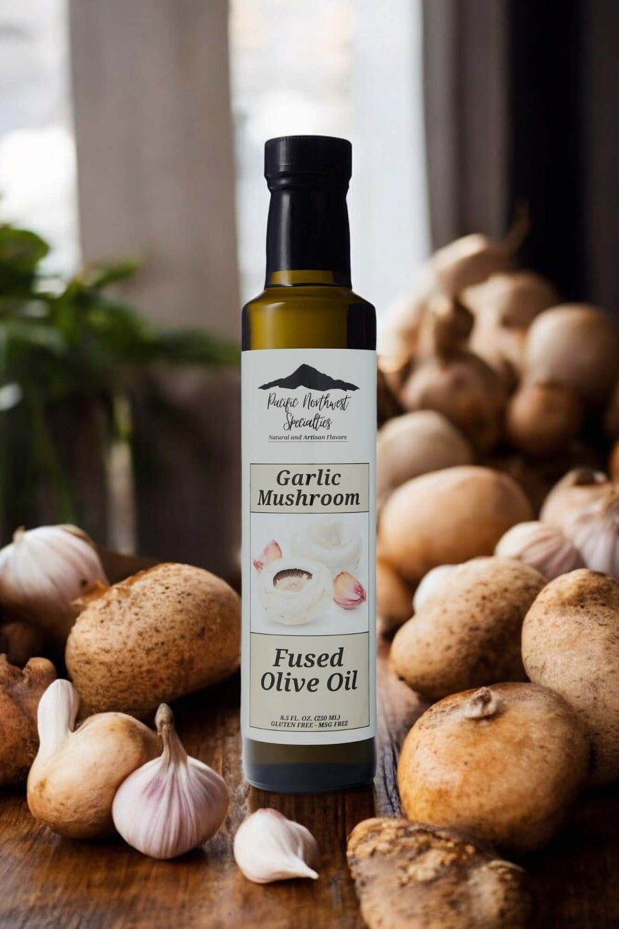 Garlic Mushroom Fused Olive Oil bottle surrounded by fresh garlic and mushrooms, perfect for enhancing dishes.